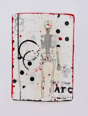 Mixed media playing card artwork with skeleton figure, red paint splatters and black dots on white background
