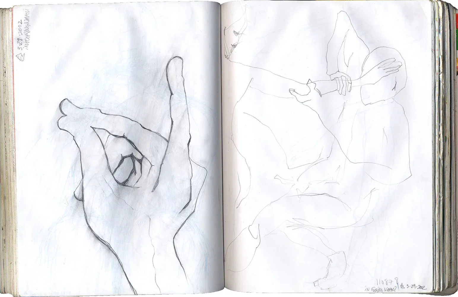 Double watercolor portrait spread — blue and red face on left, yellow-green face on right