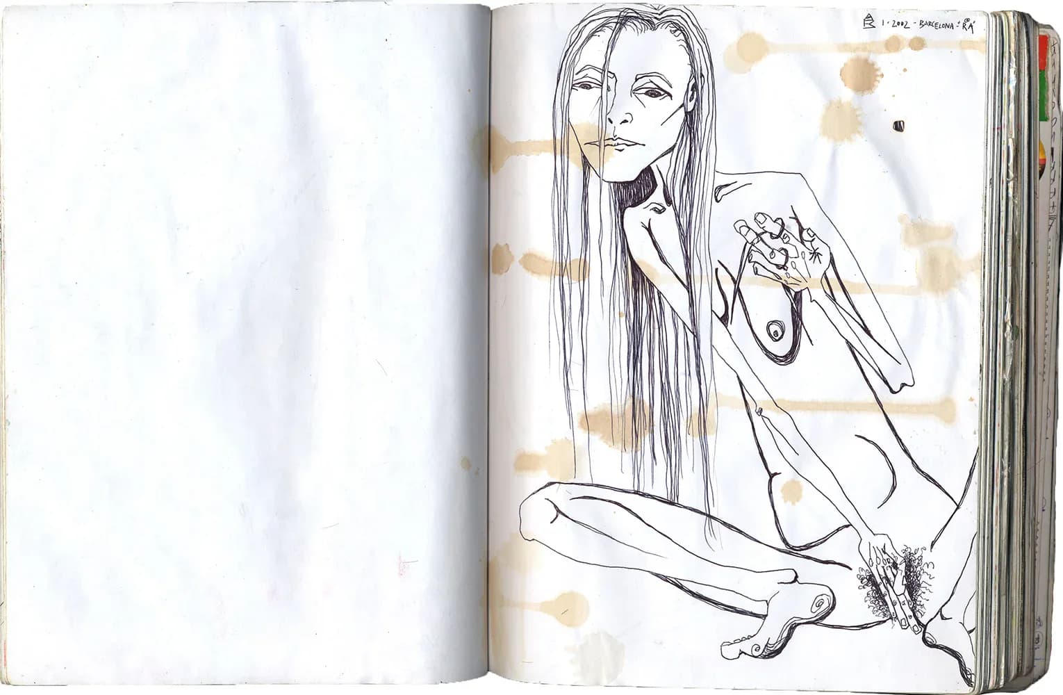 Double watercolor portrait spread — purple-green face on left, blue face on right