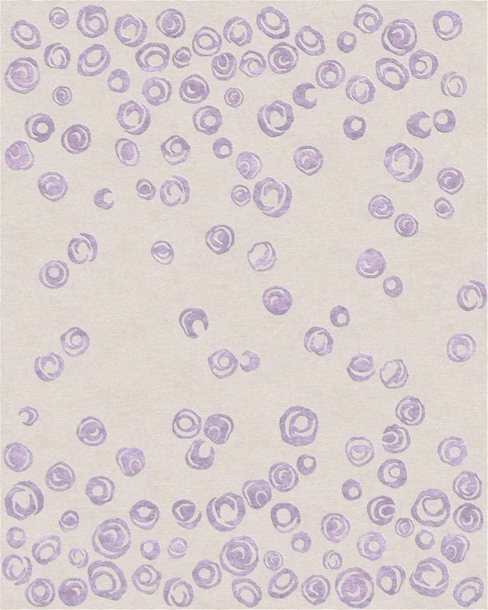 Large rug with scattered lavender swirl motifs on cream ground