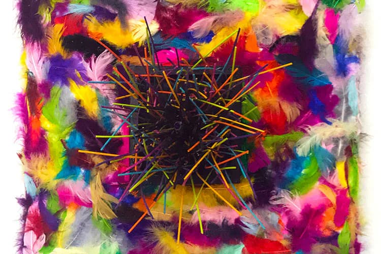 Abstract mixed-media composition with vibrant splashes of magenta, yellow, cyan, and lime green layered with black scratched lines on a dark center, creating dynamic energy across the canvas.