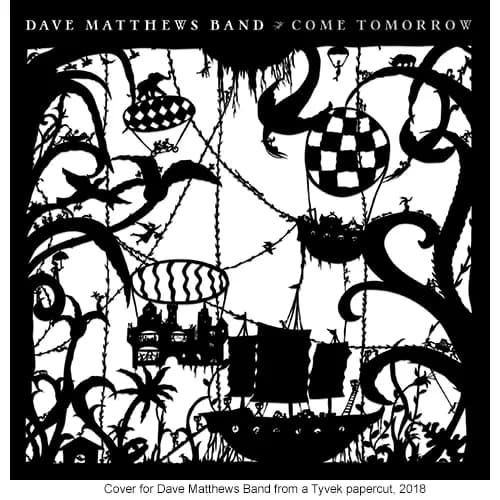 Black and white intricate paper-cut cover art by Béatrice Coron for Dave Matthews Band's 'Come Tomorrow' album, featuring ornate silhouettes of trees, ornaments, and abstract forms.