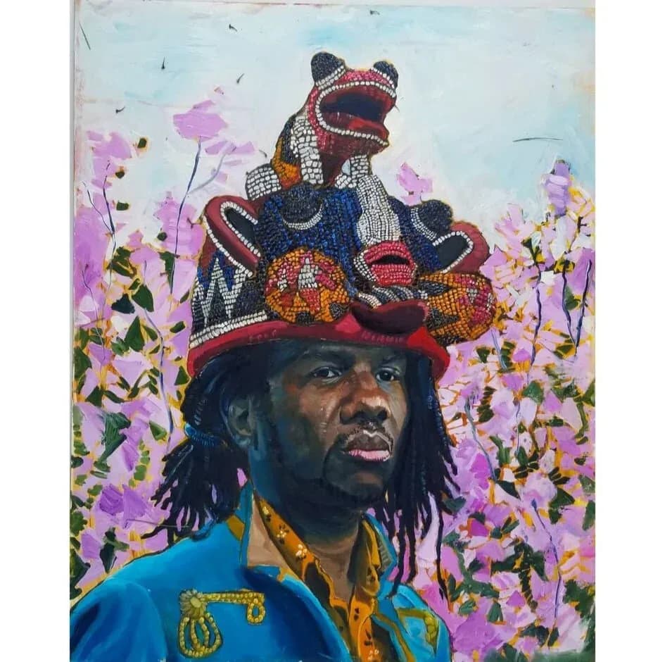 Portrait painting of man with dreadlocks wearing blue jacket, crowned with beaded black animal figurine, surrounded by purple flowers by Charles G. Esperanza.