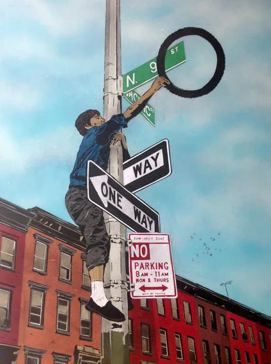 Stenciled figure reaching upward to manipulate street sign post against cloudy sky with urban buildings below.