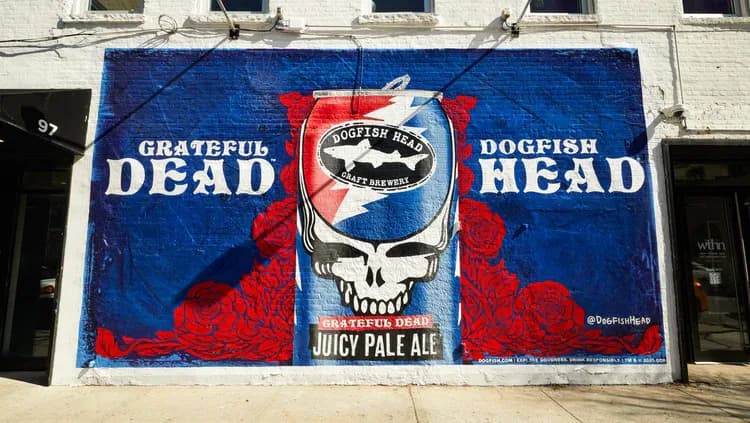 Dogfish Head Grateful Dead mural on white brick building