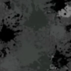 Abstract dark textured composition with black splatters and organic shapes on mottled gray background.