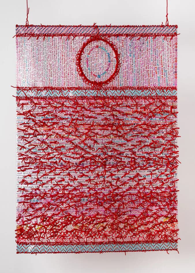 Mirror Mirror woven textile artwork with red yarn, hand-lettered text, and oval frame motif on white background