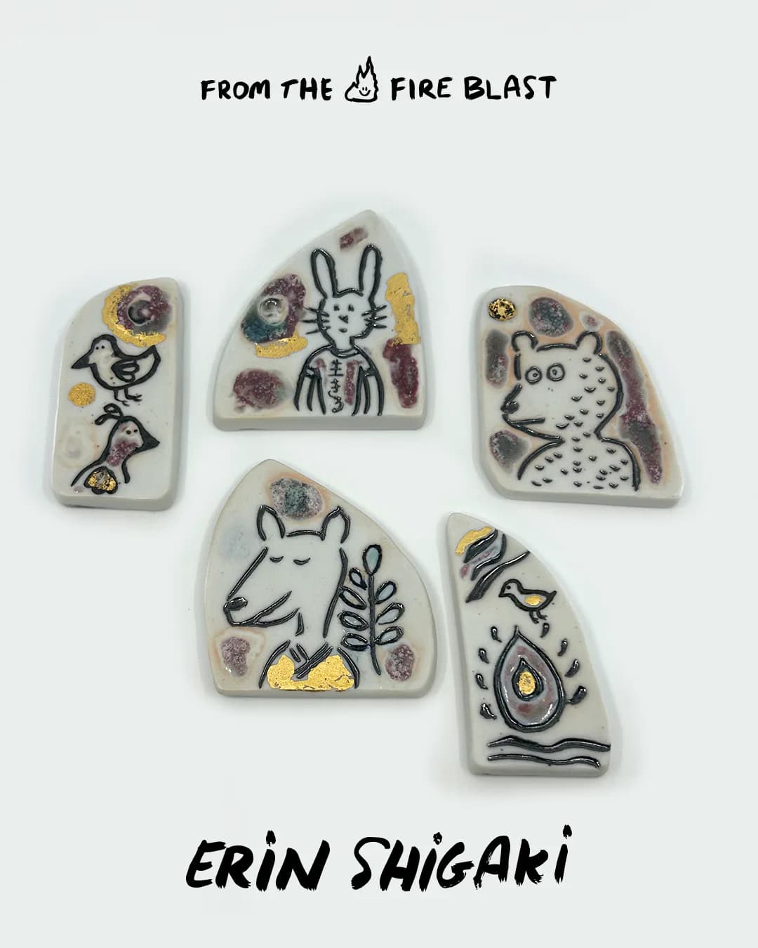 Five gray ceramic tiles with hand-drawn animal motifs (rabbit, bird, deer, ox, fire) in black ink with gold accents, by Erin Shigaki.