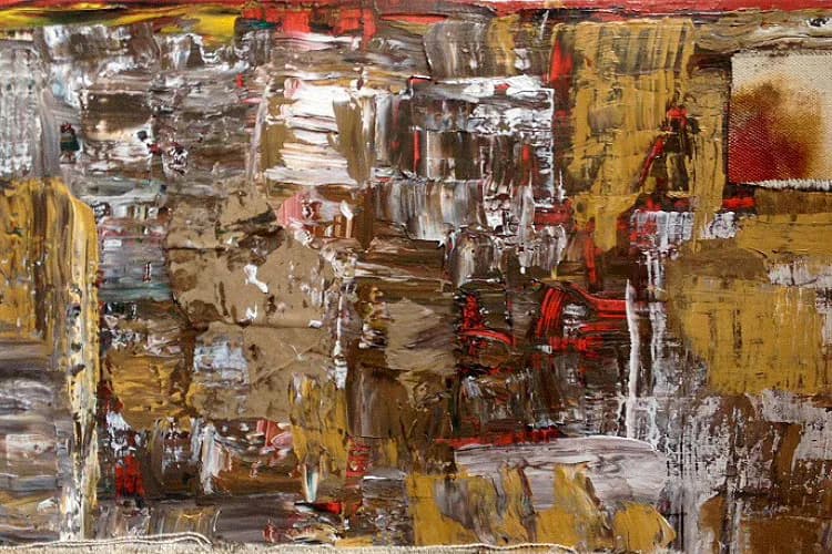 Abstract mixed-media painting with layered brushstrokes in ochre, brown, white, and red tones, creating a densely textured composition.