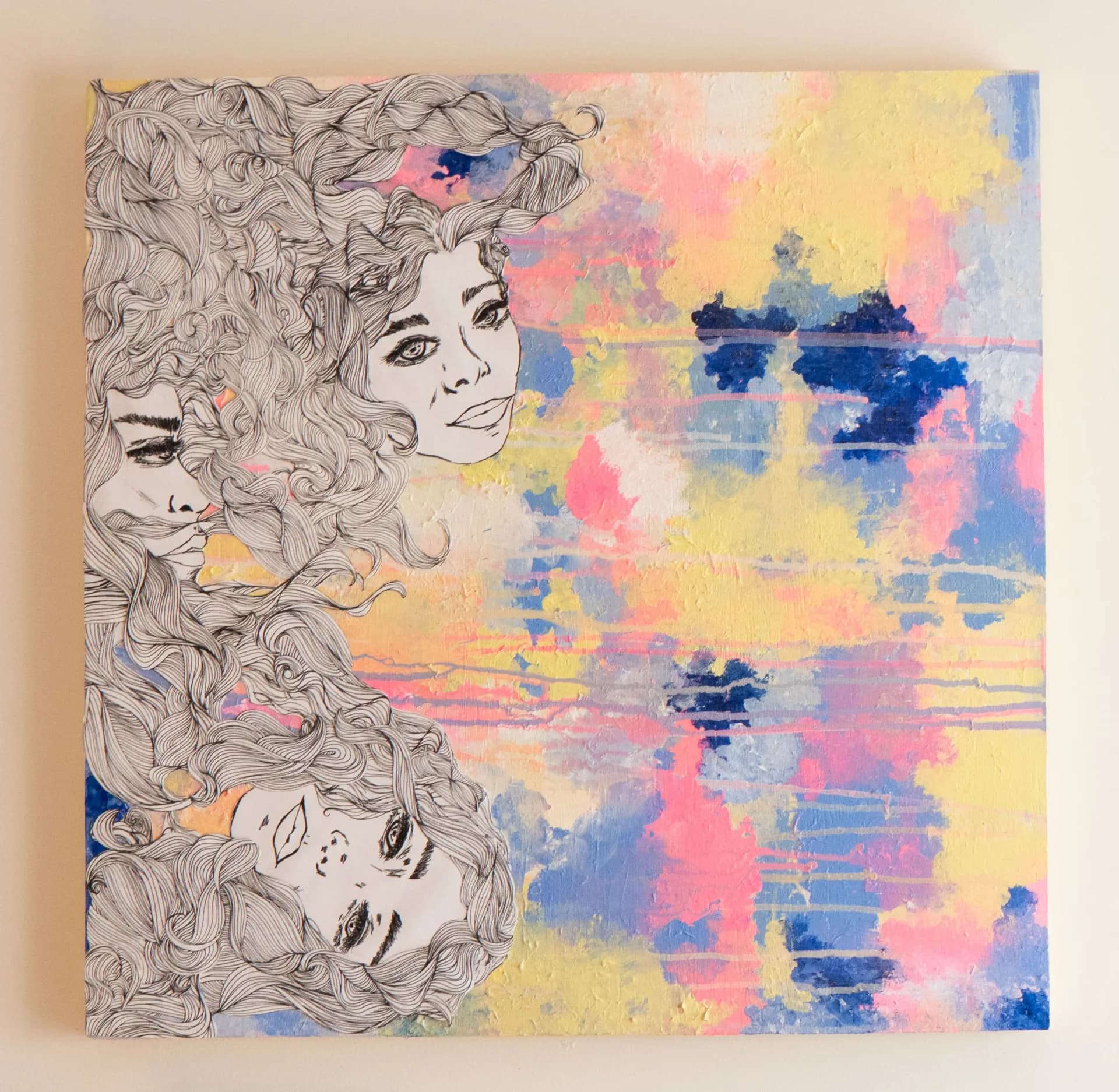 Mixed media painting of three female faces with intricate line-drawn hair over colorful abstract painted background