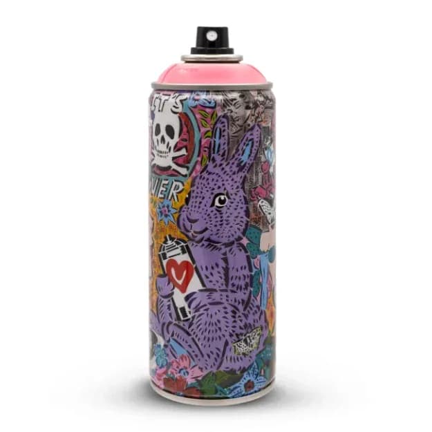 Spray paint can featuring colorful graffiti-style illustration with purple creatures, skulls, hearts, and abstract patterns.