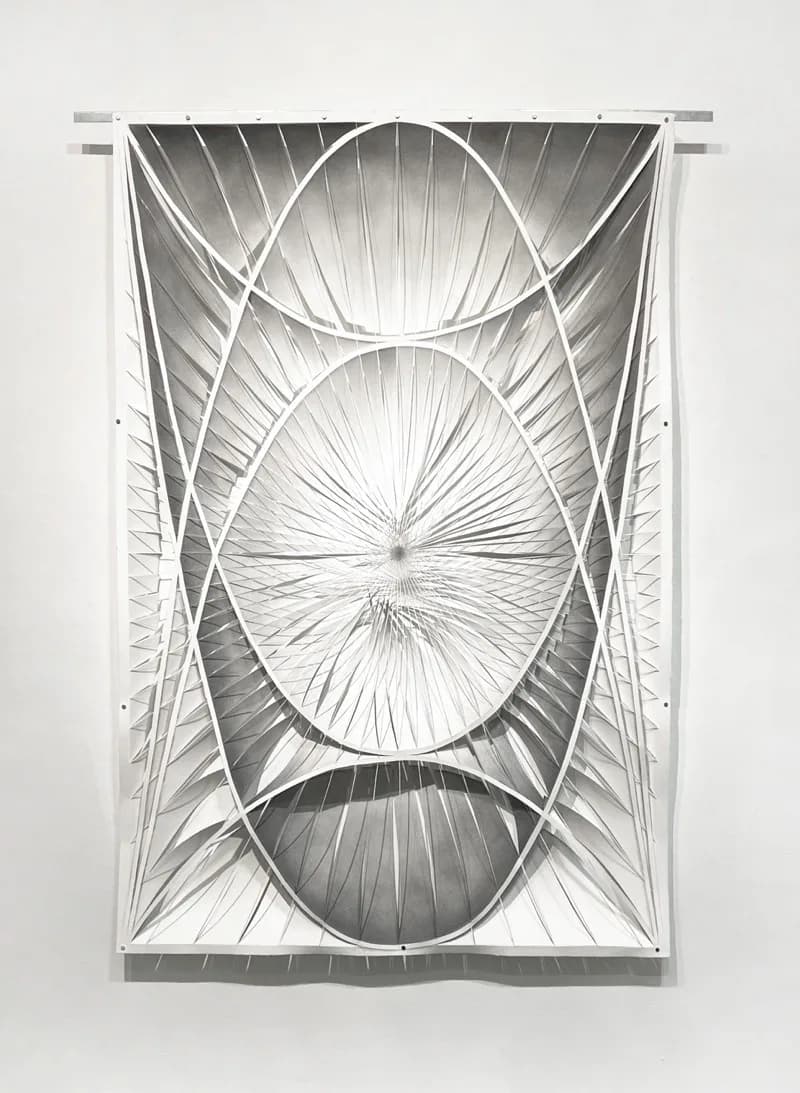 Large-scale paper artwork with radiating geometric elliptical forms and graphite shading, hung on wall with metal rods