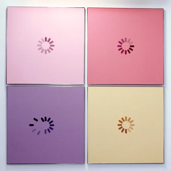 Four-panel painting with loading spinner icons on pastel pink, rose, purple, and yellow backgrounds