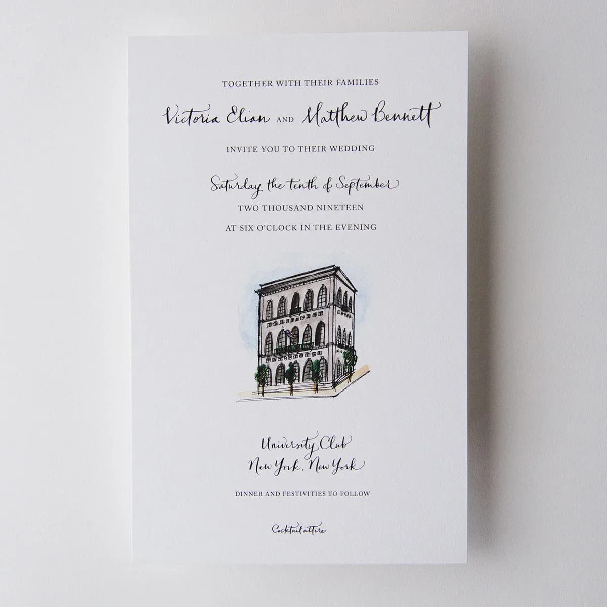 Wedding invitation with watercolor and ink illustration of The University Club building alongside calligraphy text