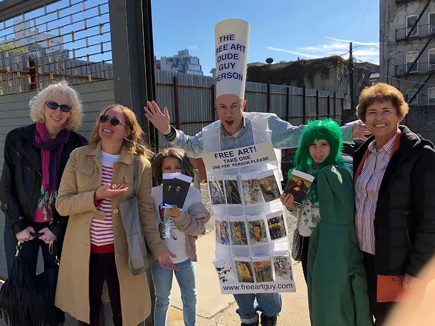 Free Art Dude Guy Person with group of art enthusiasts holding free art prints at Gowanus Open Studios 2019