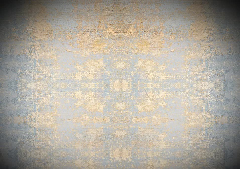 Mixed-media artwork with layered textures in blue-gray and golden tones, featuring organic forms arranged in symmetrical, mirrored patterns.