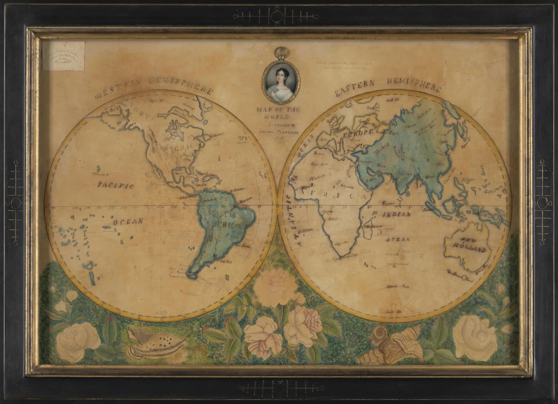Antique world map with two hemispheres in teal and cream, ornate floral border decoration, and period cartography styling.