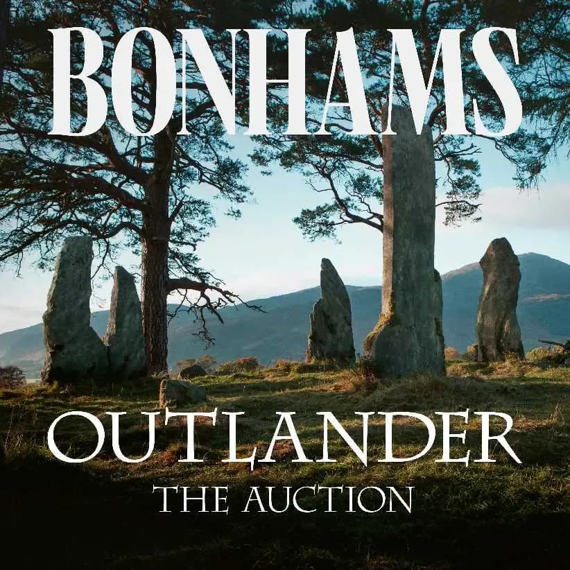 Bonhams auction announcement for 'Outlander: The Auction' featuring standing stones in a misty Highland landscape.