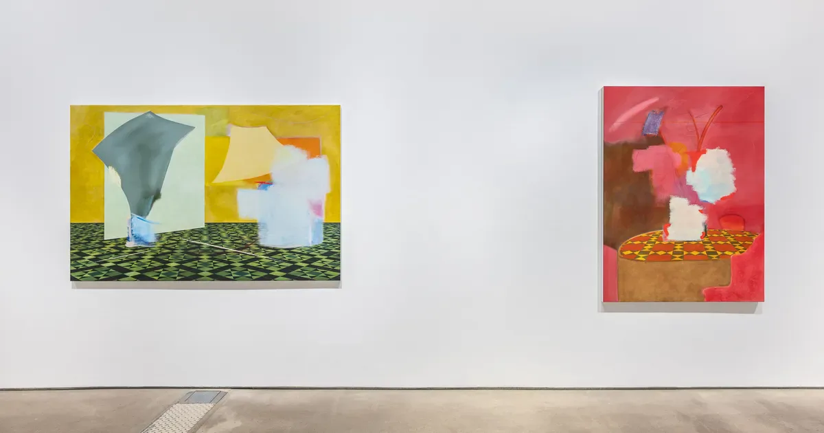 Interior view of Hales Gallery's white wall displaying two abstract paintings—one with yellow border at left, one with red background at right.