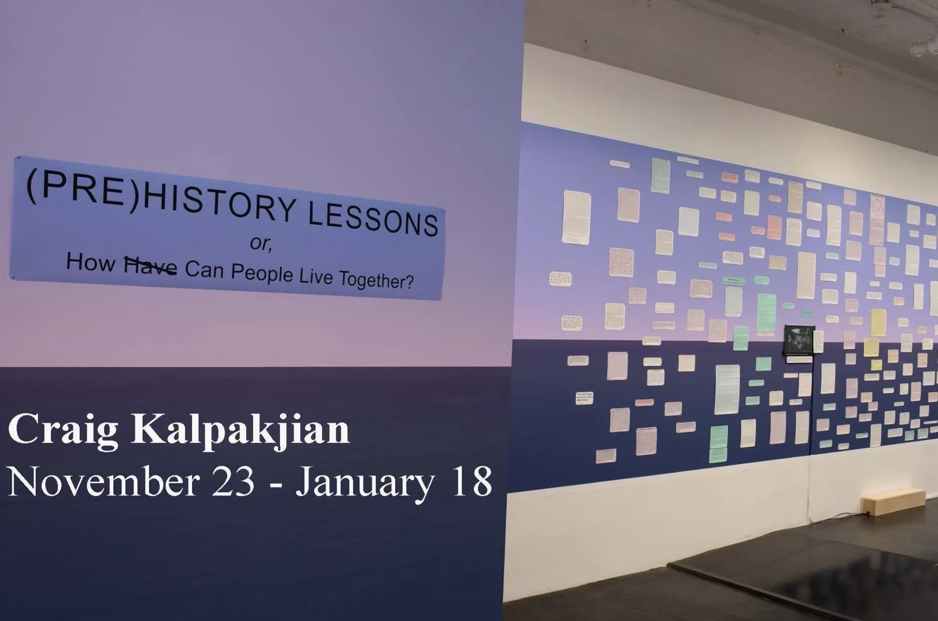 Gallery wall with purple panel reading "(PRE)HISTORY LESSONS" and grid of small colorful card artworks; text indicates Craig Kalpakjian exhibition November 23–January 18.
