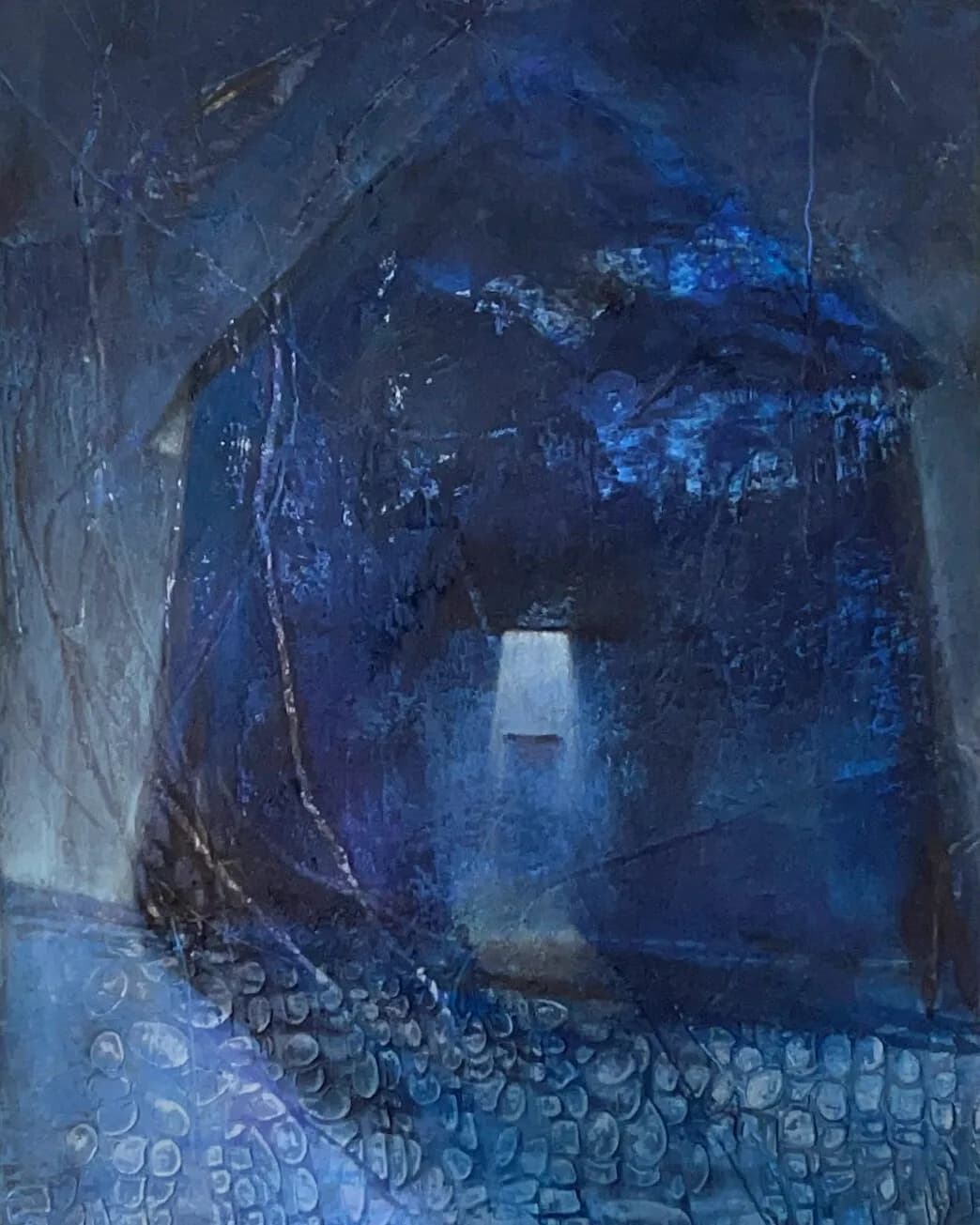 Abstract mixed-media painting dominated by deep blue tones with layered brushstrokes, a bright rectangular window or portal, and textured patterned elements at the base.