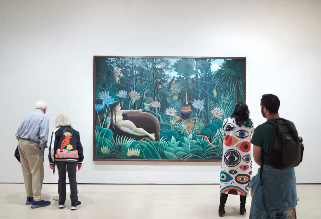 Gallery visitors viewing a large tropical-themed painting in white-walled New Museum interior space.