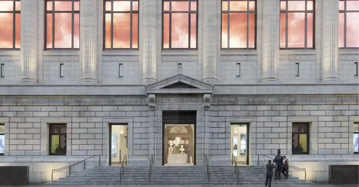Neoclassical building facade with gray stone, tall columns, rectangular windows with pink-toned glass, central entrance with pediment, and wide steps with people.