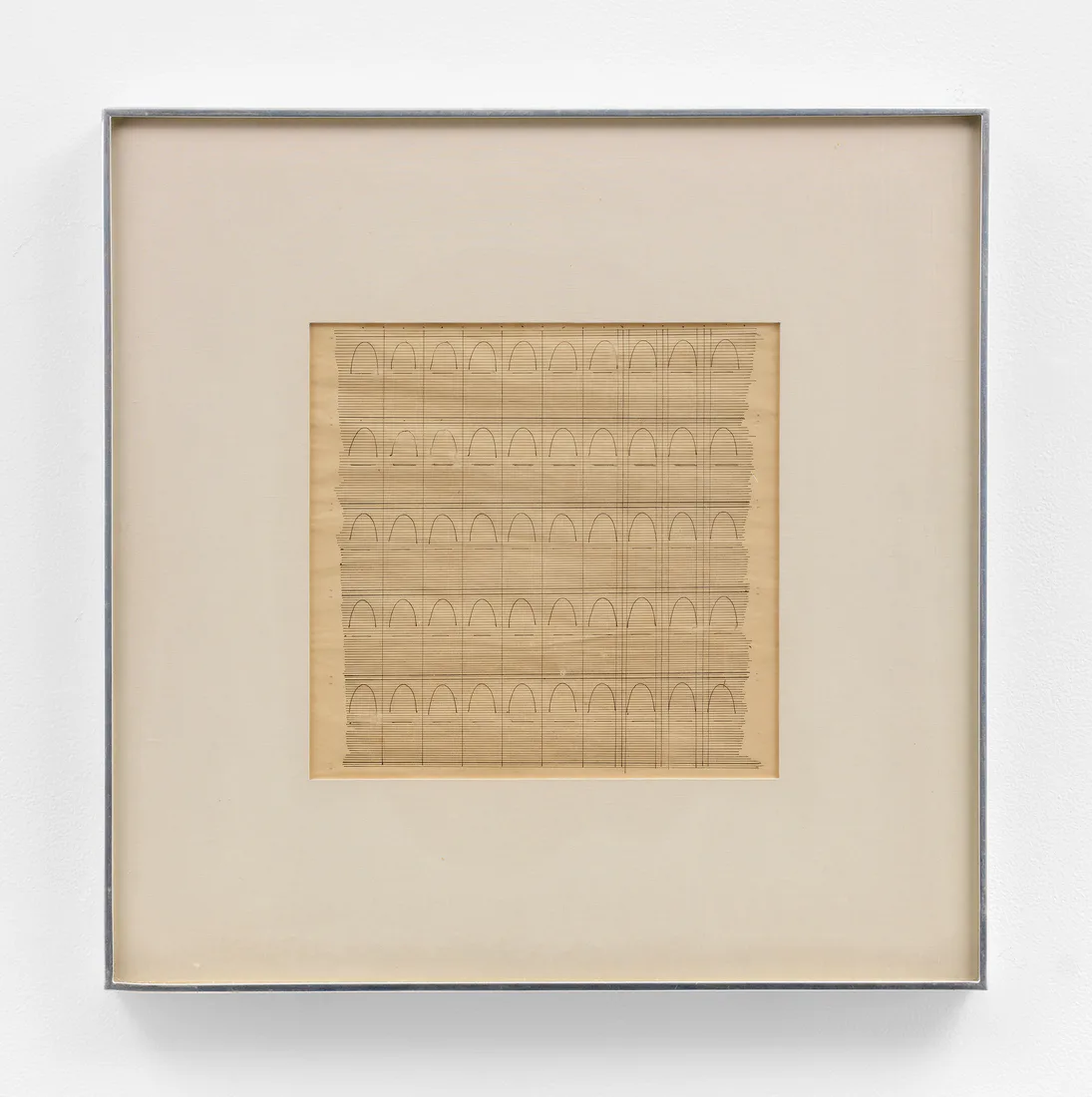Framed architectural drawing on tan paper showing a grid of repeated arched doorway or arcade designs in sepia tones.