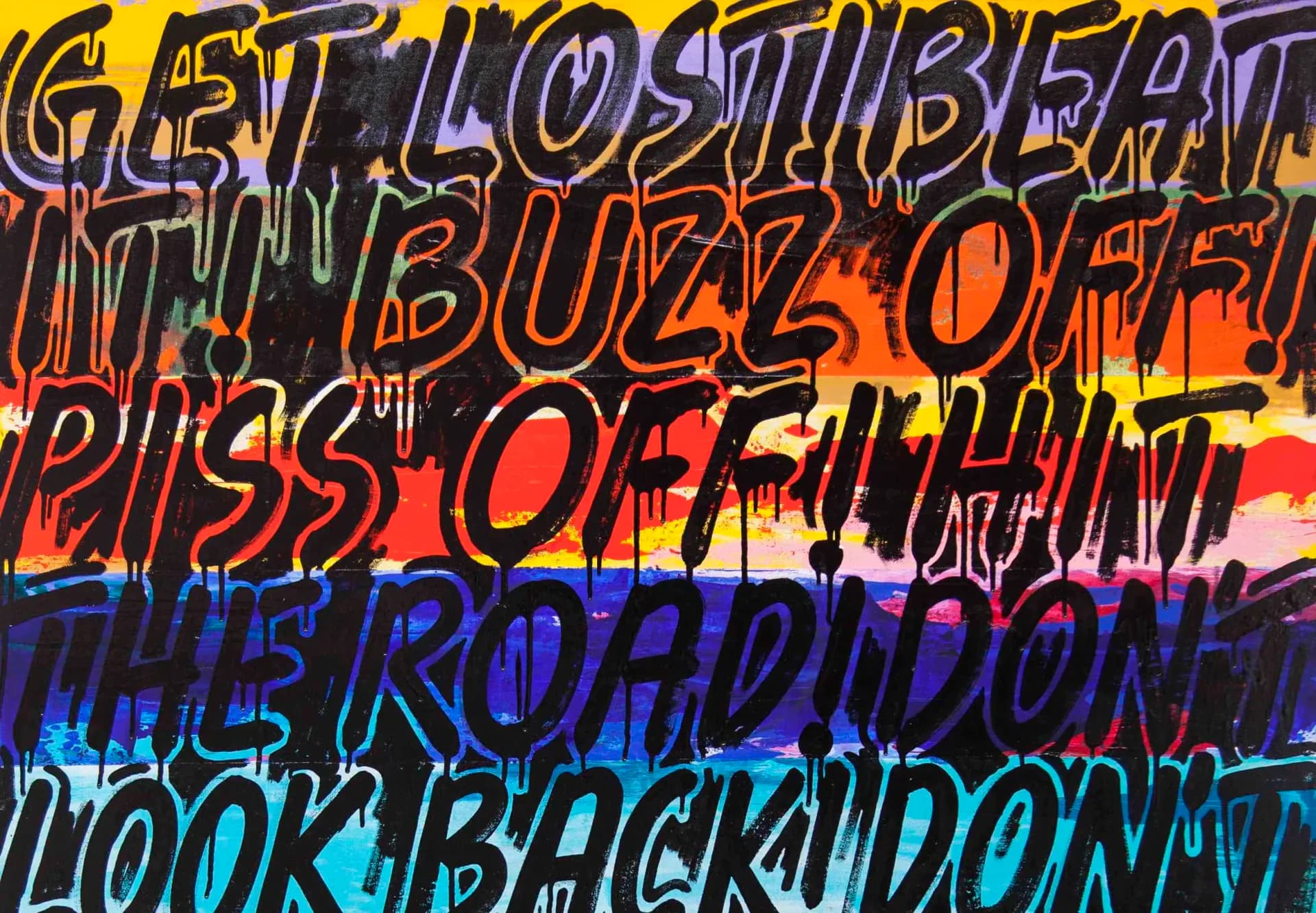 Vibrant neon-colored text art with overlapping bold letters in orange, yellow, blue, and pink against dark background.