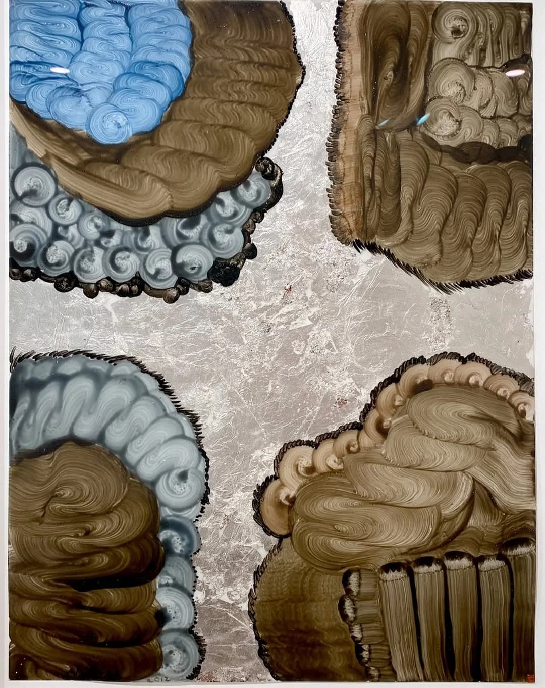 Four abstract relief panels with organic swirling forms in tan, brown, and white, separated by a cream dividing line.