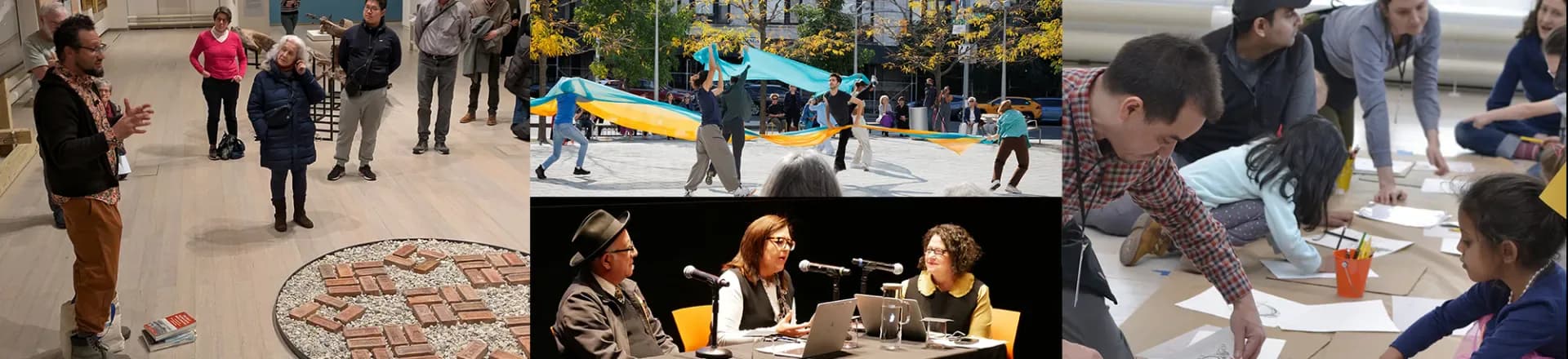 Outdoor gallery event at Wallach Art Gallery with visitors viewing artworks on ground and walls, including a circular installation and people seated at tables.
